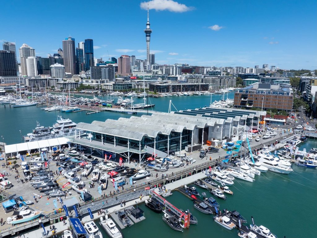 A wide-angle photo from the show featuring the Viaduct Harbour with boats on display